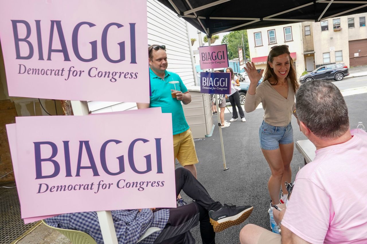 New York state Sen. Alessandra Biaggi high fives a volunteer during a canvass launch event for her campaign on August 13 in Sleepy Hollow, New York.