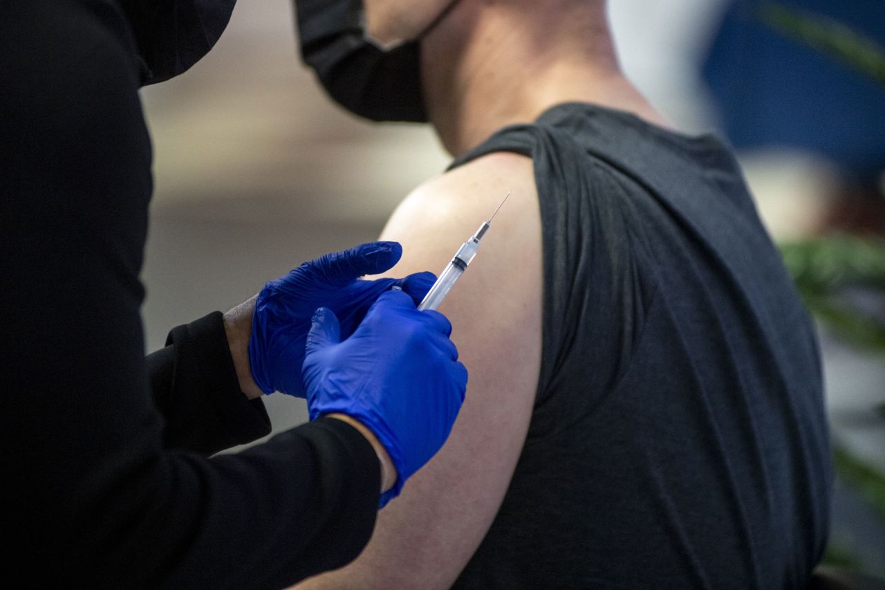 A health care worker prepares a dose of the Moderna Covid-19 vaccine in Secaucus, New Jersey, on February 28.