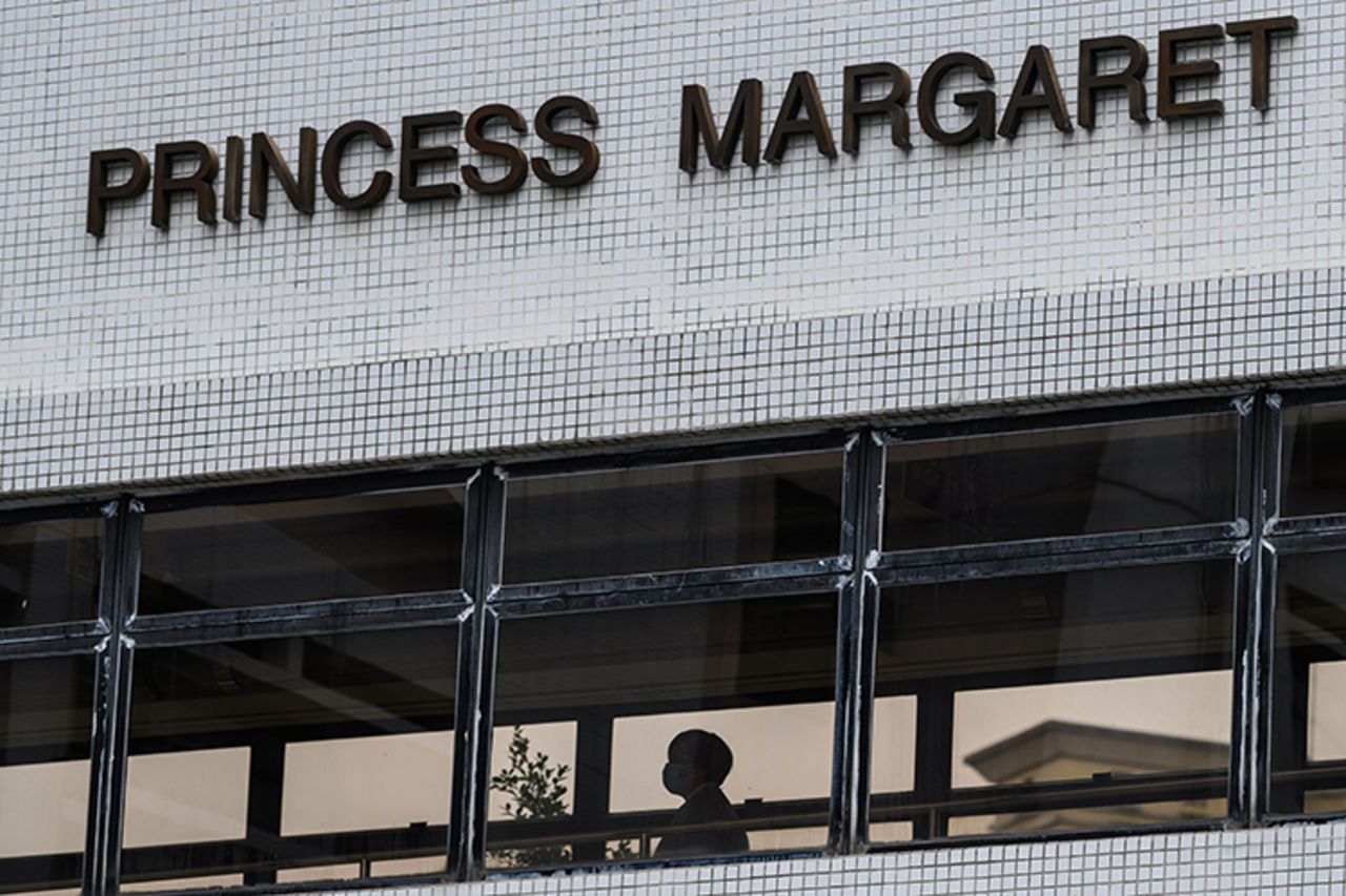 A medical worker walks on a bridge in Princess Margaret Hospital in Hong Kong on Tuesday, February 4.