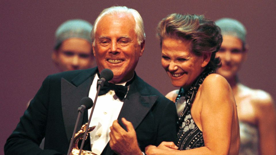 Claudia Cardinale congratulates Giorgio Armani after he received the 