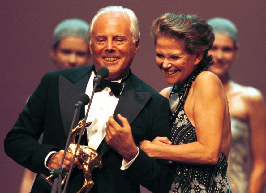 Claudia Cardinale congratulates Giorgio Armani after he received the 