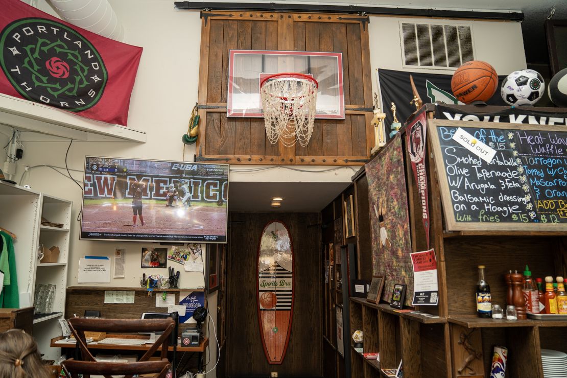 The crystal basketball hoop chandelier is a hallmark of The Sports Bra.