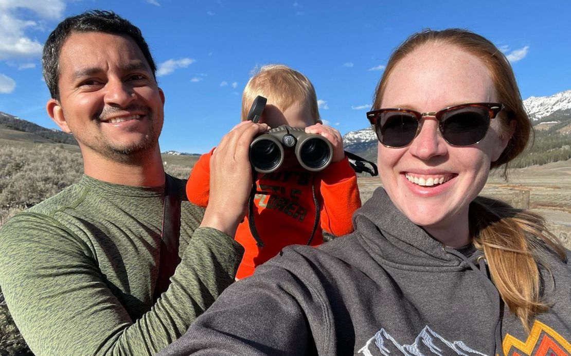 Adrian and Laura exploring Yellowstone National Park with their daughter.