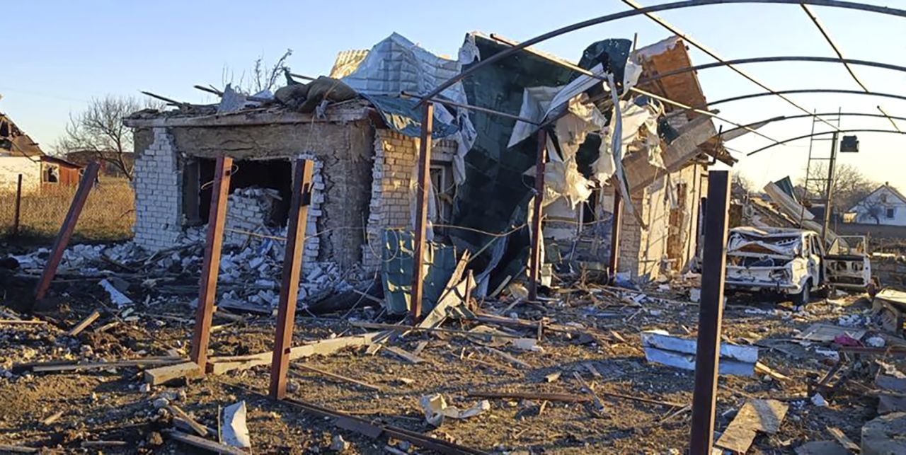 In this photo provided by the Zaporizhzhia region military administration, a damaged building and a car are seen after a Russian strike in the village of Novosofiivka, in the Zaporizhzhia region, Ukraine, on December 5.
