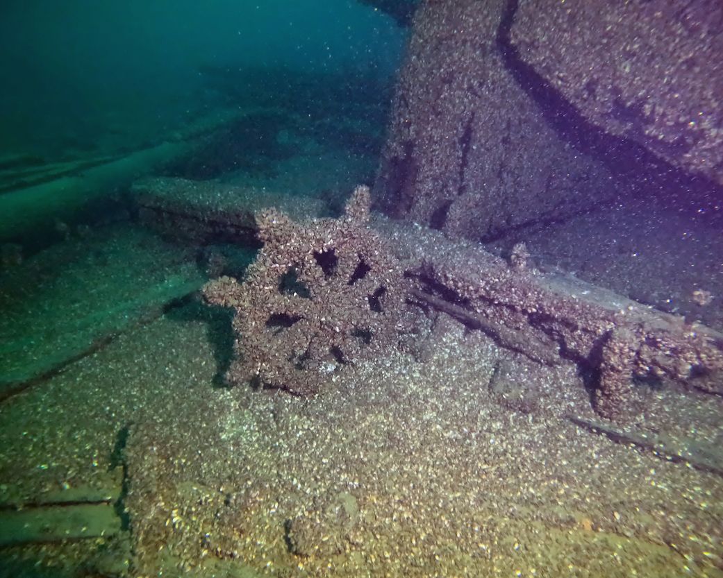 The F.J. King's wheel sits on the bottom of Lake Michigan just off the ship's stern.