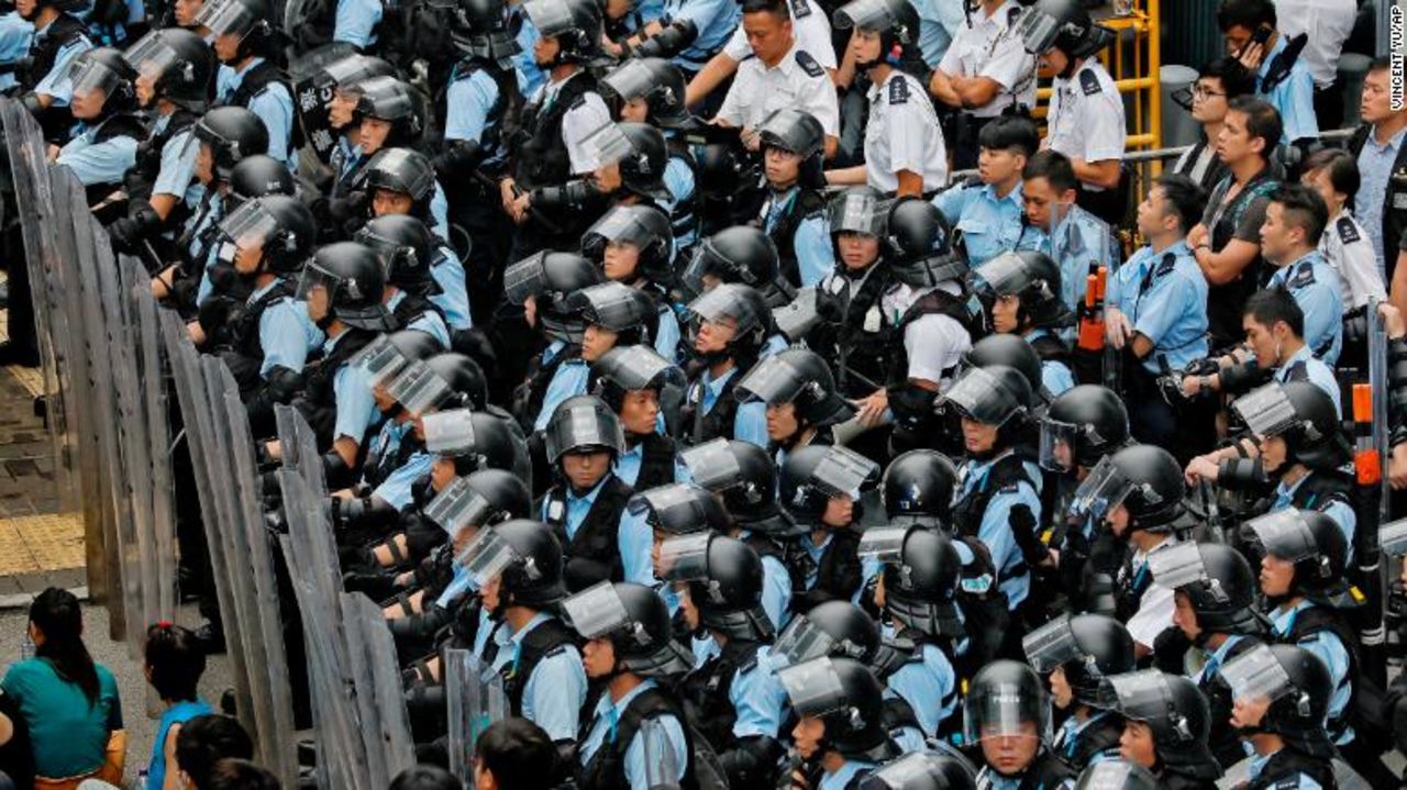 Policemen in anti-riot gear outside Hong Kong's Legislative Council. 