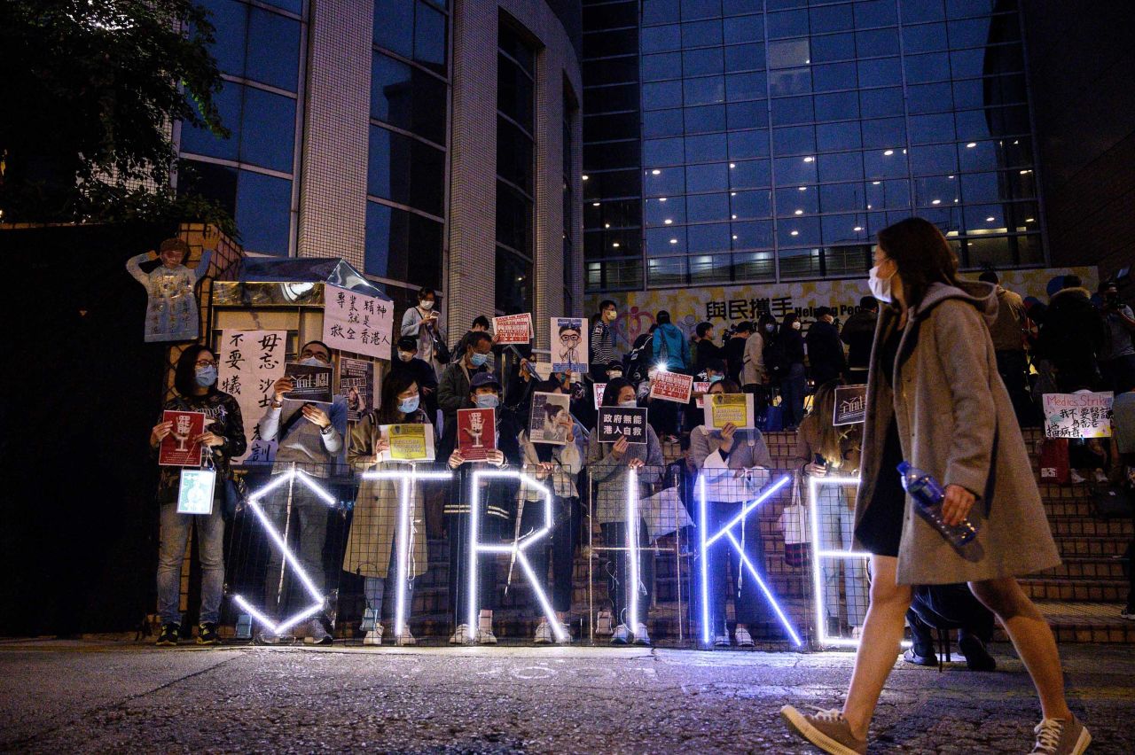 A light installation is displayed by striking members of the Hospital Authority Employees Alliance (HAEA) and other activists at the Hospital Authority building in Hong Kong on Friday.