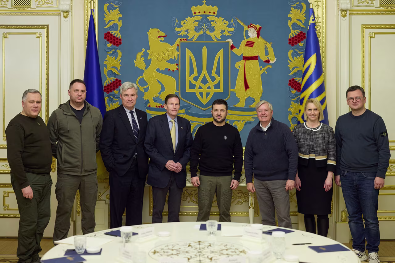 Ukraine's President Volodymyr Zelensky poses for a picture with US Sens. Lindsey Graham, Richard Blumenthal and Sheldon Whitehouse during a meeting in Kyiv, Ukraine, on Friday.