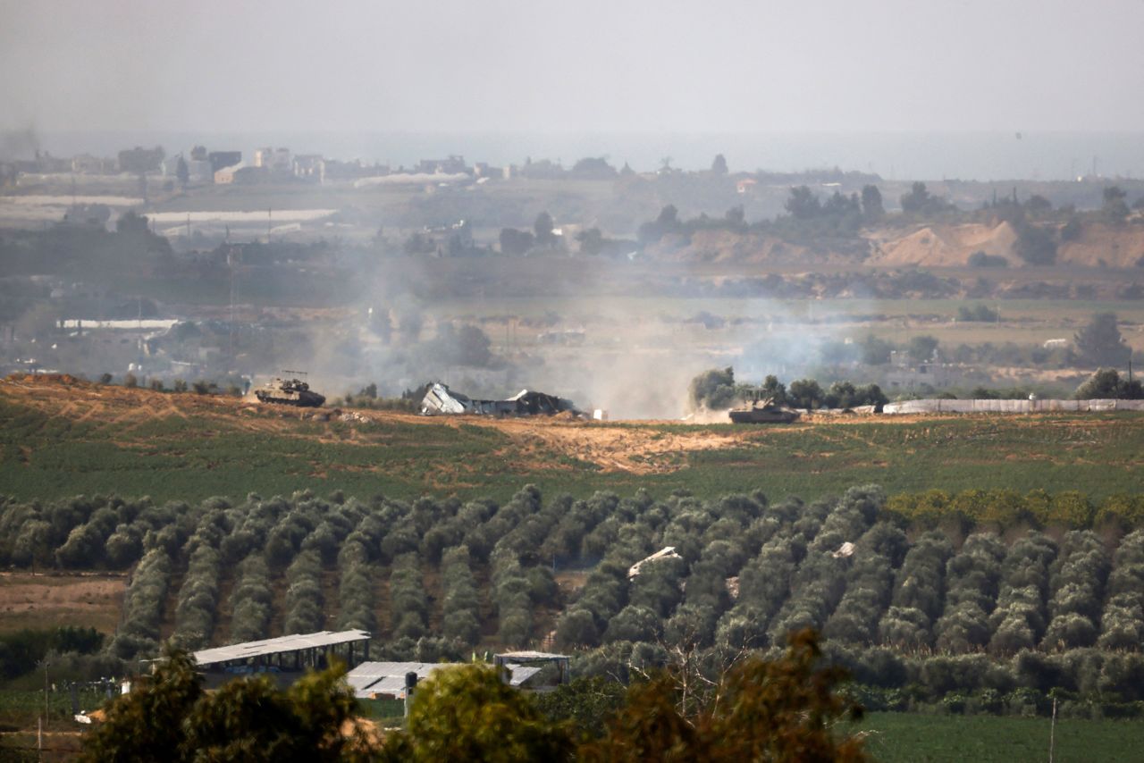 Israeli tanks manoeuvre inside Gaza on October 30.