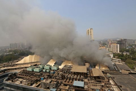 Smoke rises from a fire that broke out at Dreams Mall Sunrise Hospital in Mumbai, India on March 26.