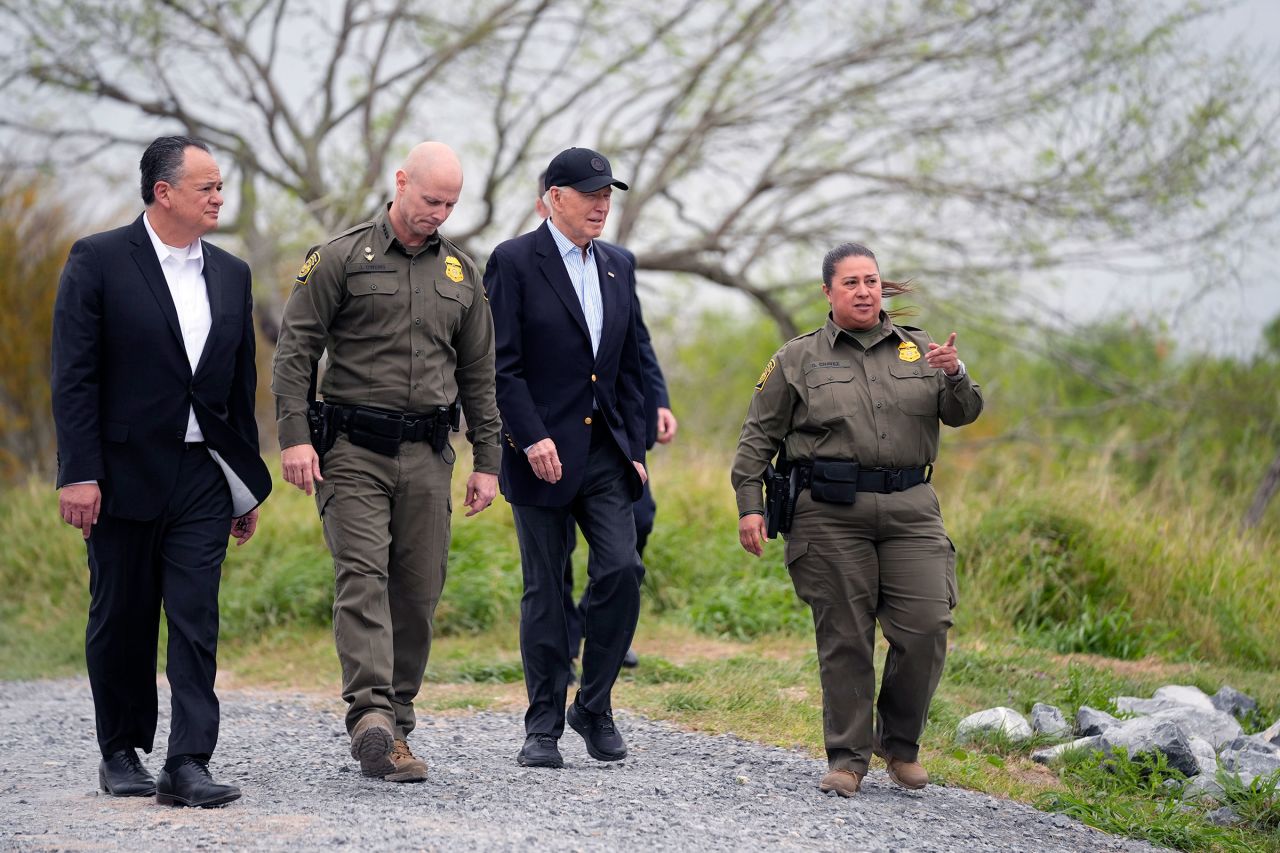 President Joe Biden, second from the right, looks over the southern border on Thursday in Brownsville, Texas.