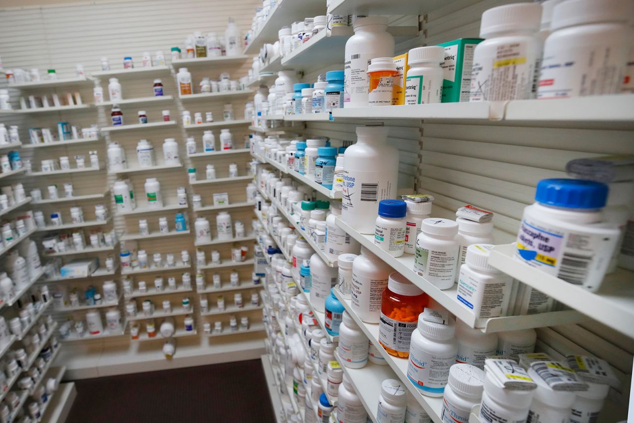 Bottles of pills sit on shelves at Rock Canyon Pharmacy in Provo, Utah, on May 20.