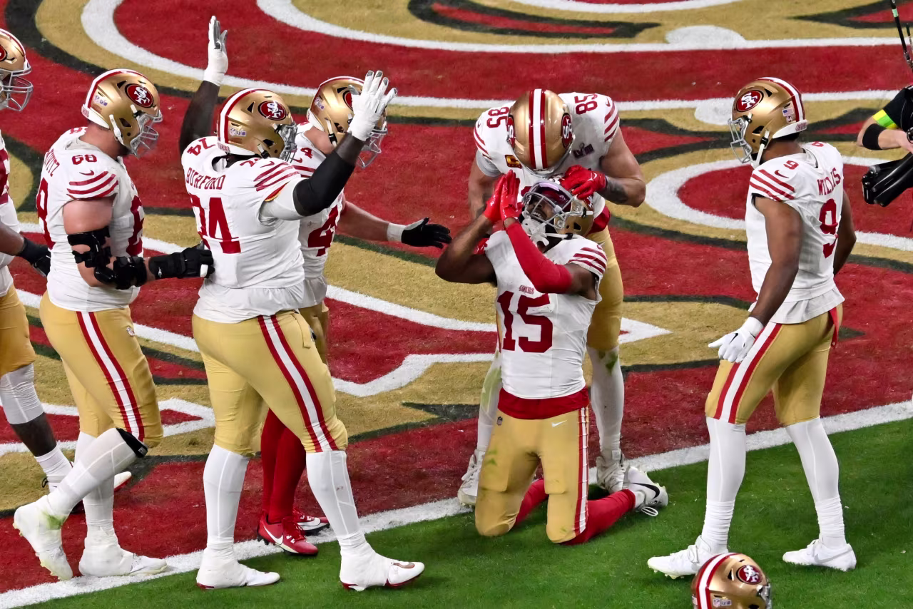 San Francisco 49ers wide receiver Jauan Jennings celebrates after scoring a touchdown.