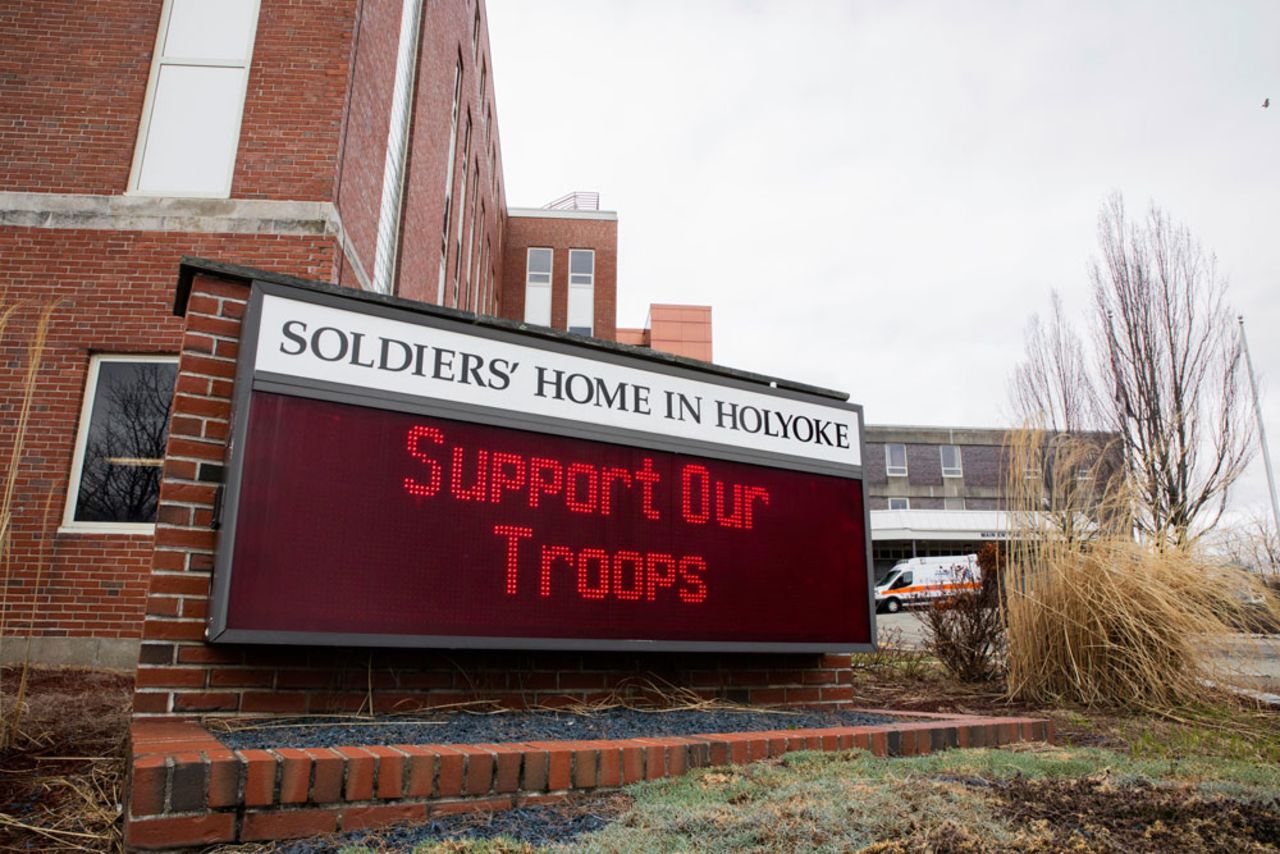 An ambulance is parked outside of the Soldiers' Home, on Tuesday morning, March 31, in Holyoke, Mass. 