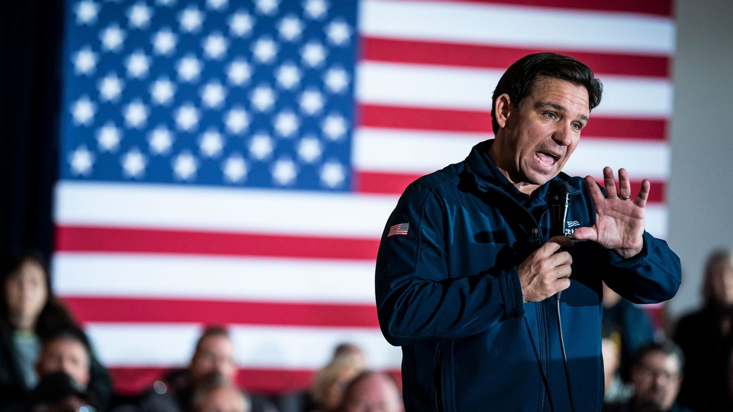 Florida Gov. Ron DeSantis speaks at a rally celebrating his 99th Iowa County held at the Thunderdome on Saturday, December 2, in Newton, Iowa.
