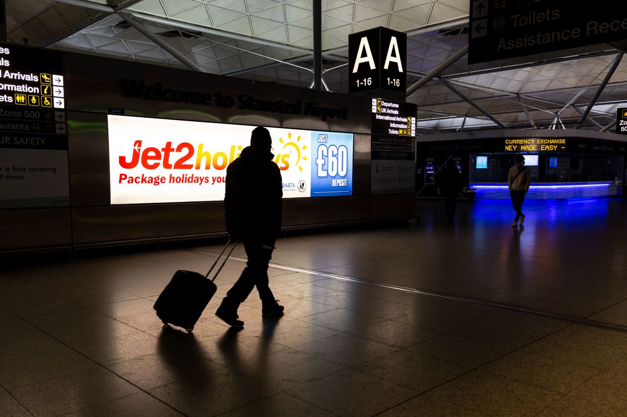 A passenger is seen arriving at London Stansted Airport in London, England, on January 9.