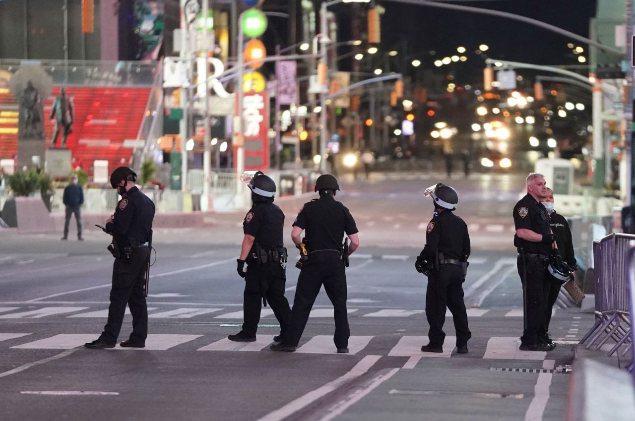 New York police officers patrol the streets on Monday night.