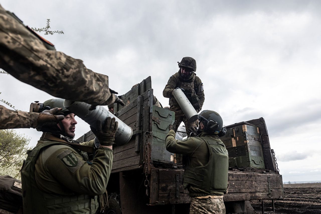 Ukrainian soldiers unload ammunition from a truck near Bakhmut, Ukraine, in April.