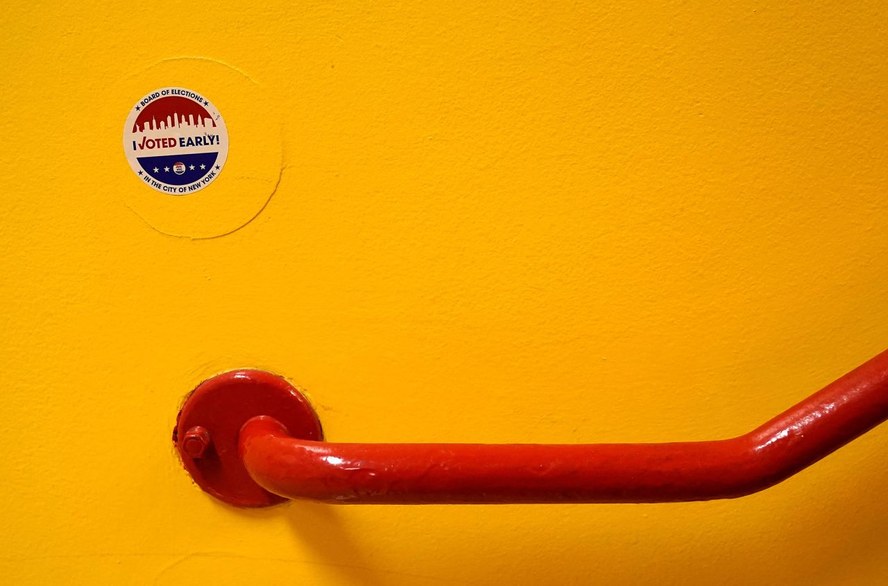 An "I Voted Early" sticker is seen at a wall of the Edward A. Reynolds West Side High School in New York on Tuesday.