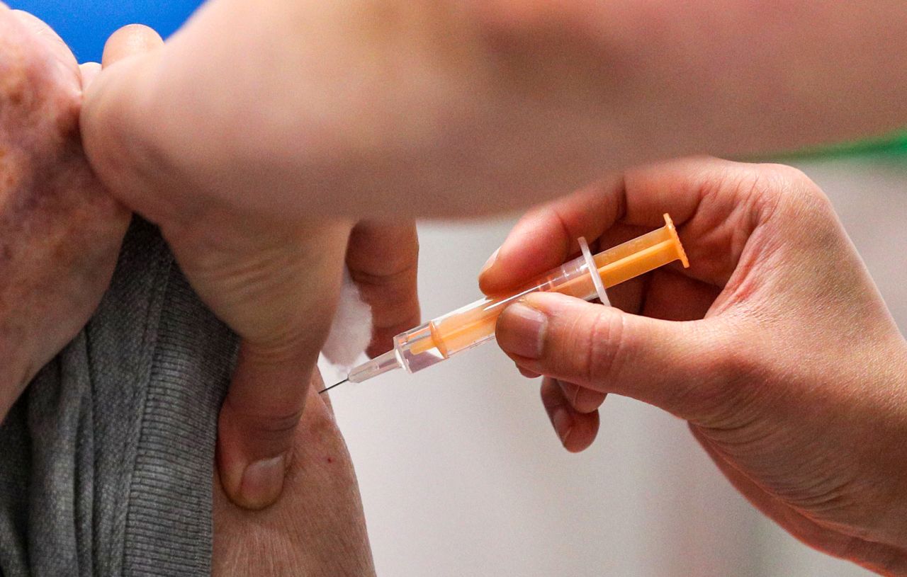 A nurse administers a Covid-19 vaccine at Blackburn Cathedral on Monday, January 18, in Blackburn, England.?