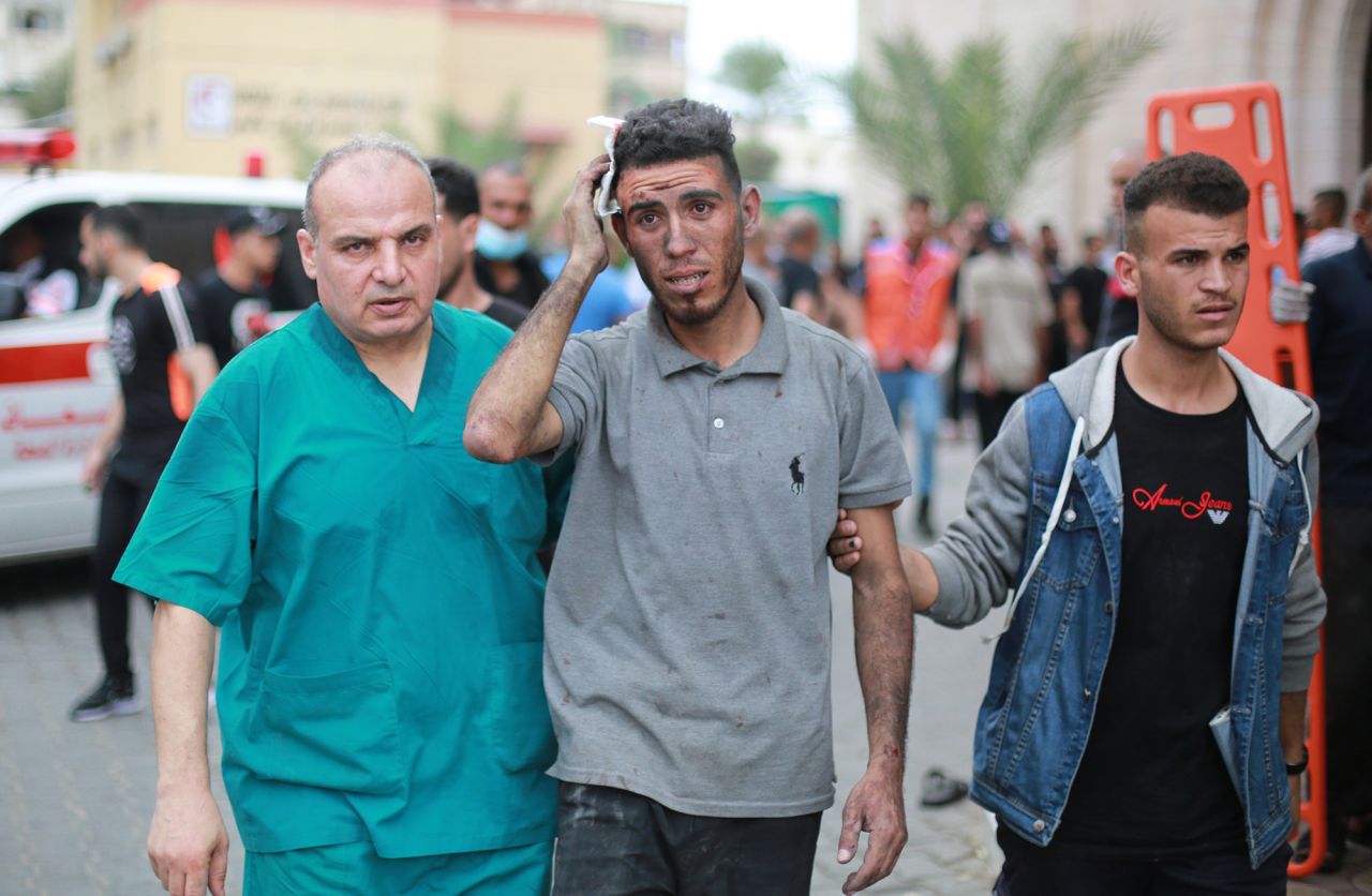 Palestinians transport the injured to the Indonesian Hospital in Jabalia, Gaza, on October 9.