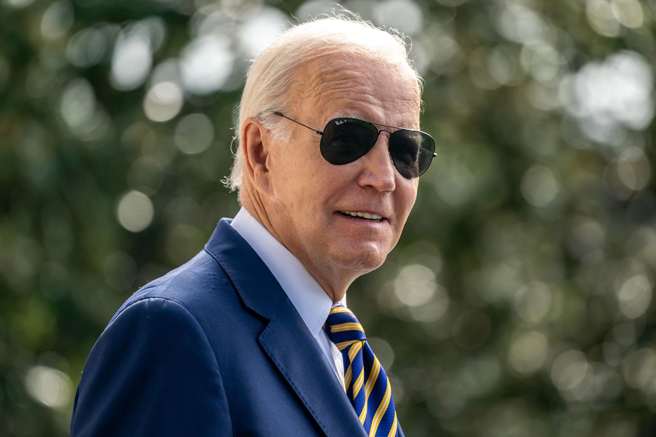 President Joe Biden walks on the South Lawn of the White House on August 15. 