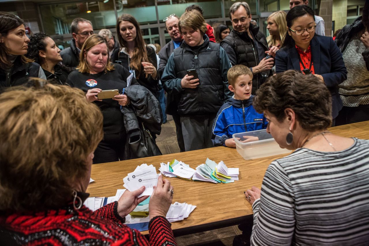 Ballots are counted following the Republican party caucus in precinct 317 in West Des Moines, Iowa, in February 2016.