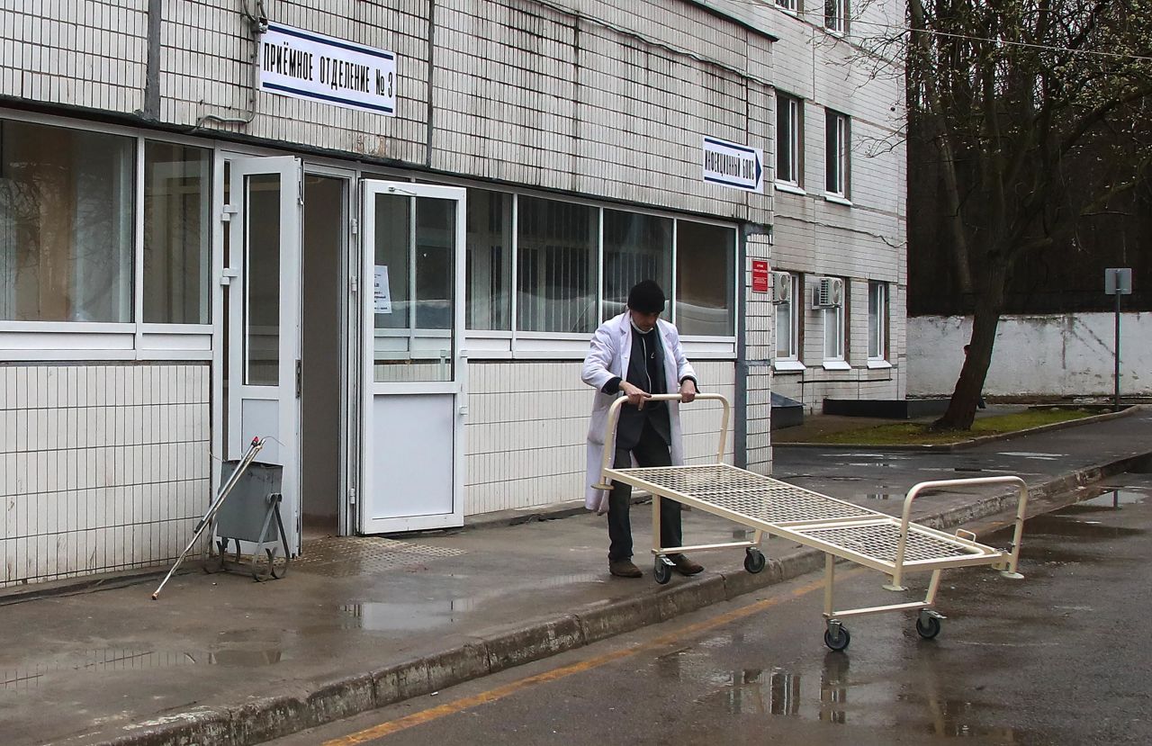 A hospital bed is moved at Spasokukotsky Municipal Clinical Hospital, which has been converted into an facility to treat coronavirus patients, in Moscow, Russia, on April 14.