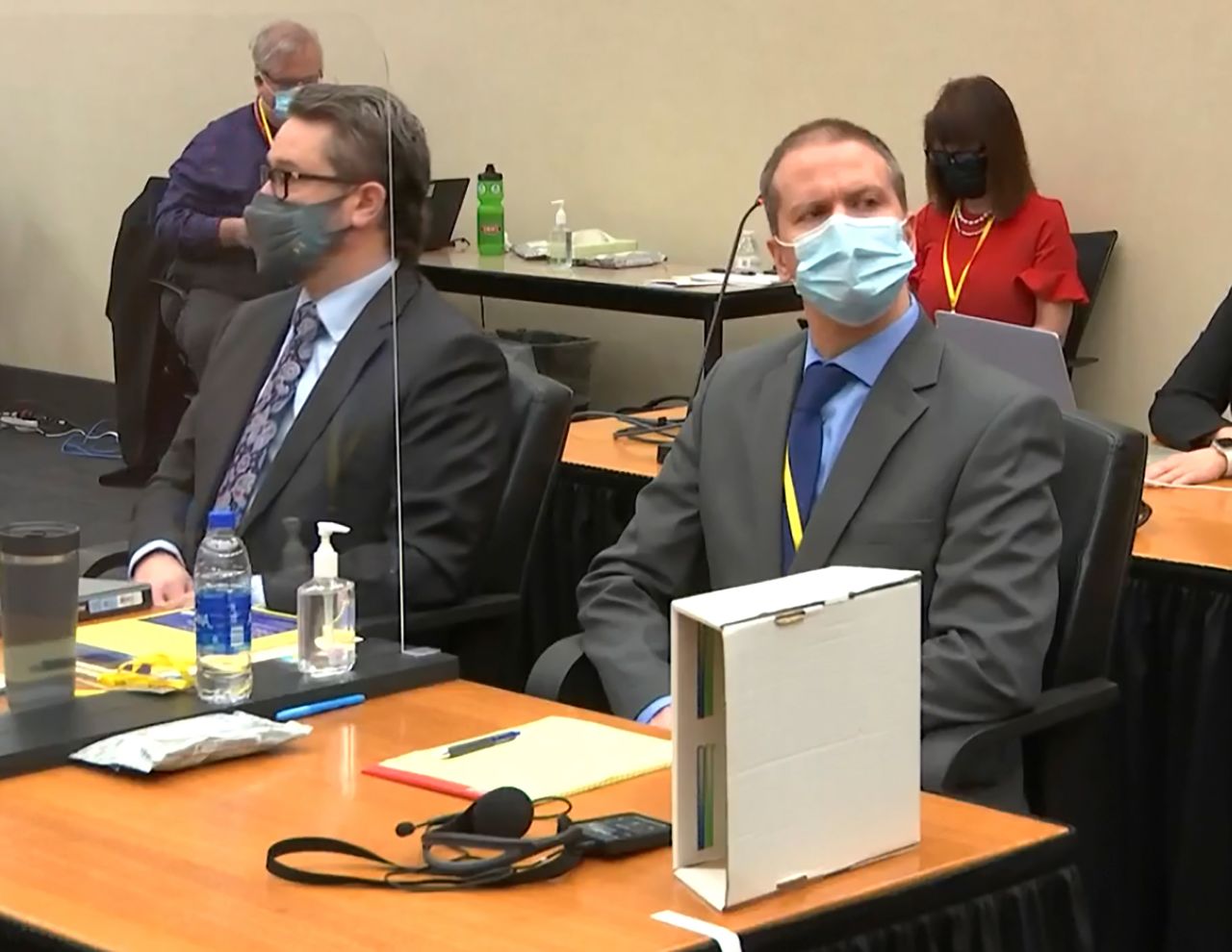 Defense attorney Eric Nelson, left, and former Minneapolis police officer Derek Chauvin listen during pre-trial motions on March 29 in the trial of Chauvin at Hennepin County Courthouse in Minneapolis, Minnesota. 