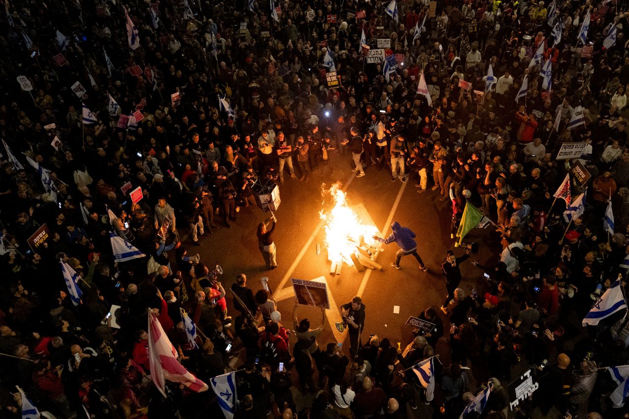 Protesters set a fire during a demonstration in Tel Aviv, Israel, on March 16. 