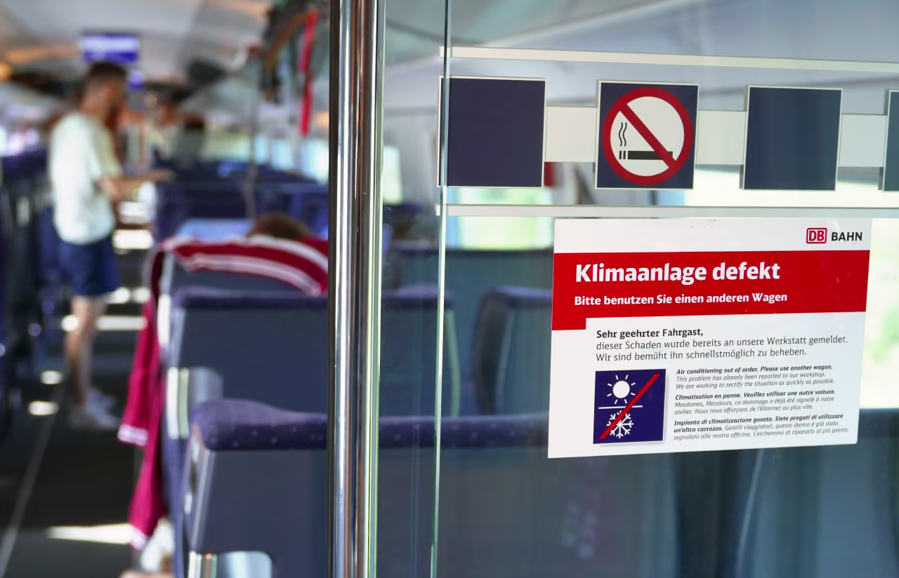 A sticker on a train from Munich to Berlin reads: "Air conditioning defective." (Martin Schutt/DPA/Getty Images)