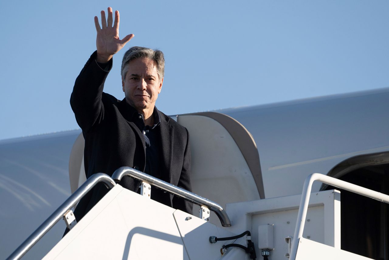 Antony Blinken boards his aircraft prior to departure at Andrews Air Force Base, Maryland on November 27, as he travels to Brussels for a NATO Foreign Ministers meeting.