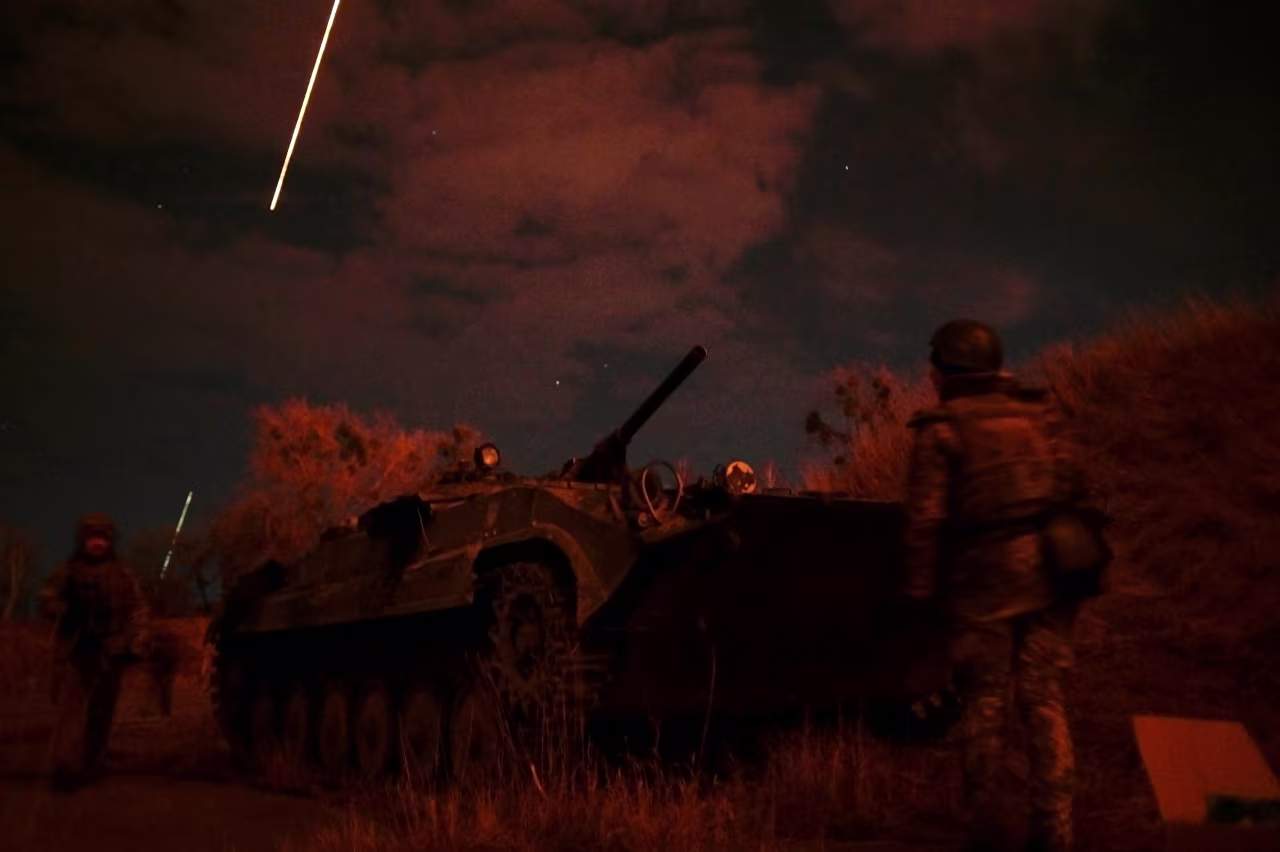 Ukrainian service members take position at the Vasylkiv Air Base near Kyiv on February 27.