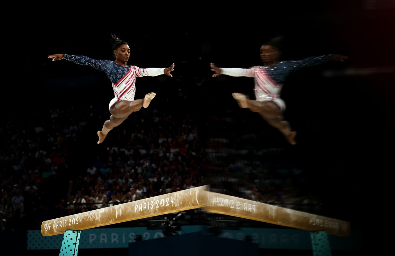 Biles competes on the balance beam. She had a few moments of catching her balance but she finished it in typical fashion, flipping through the air on her dismount to finish with a score of 14.366.