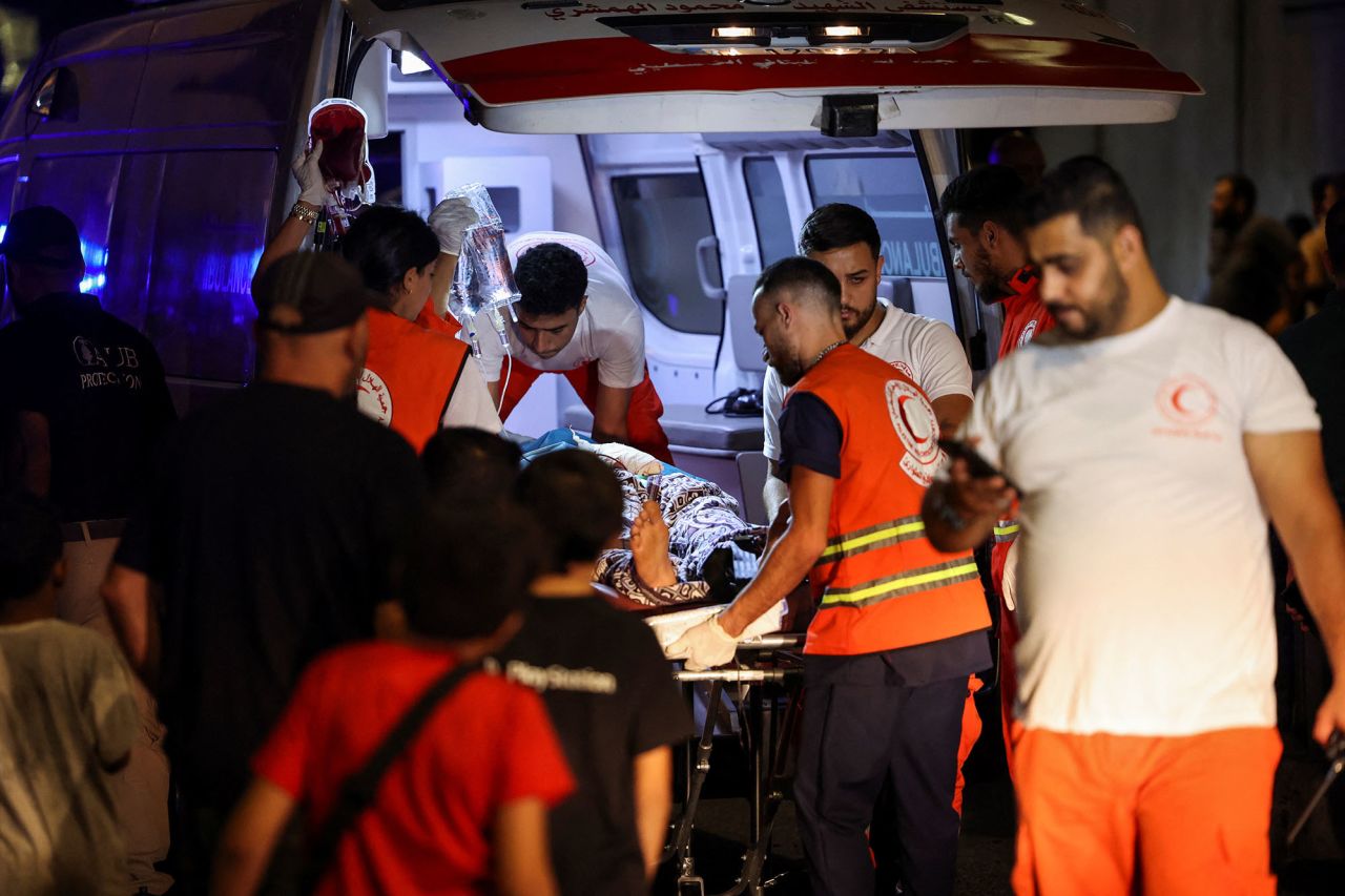 A person is carried on a stretcher outside American University of Beirut Medical Center in Beirut, Lebanon, on September 17.