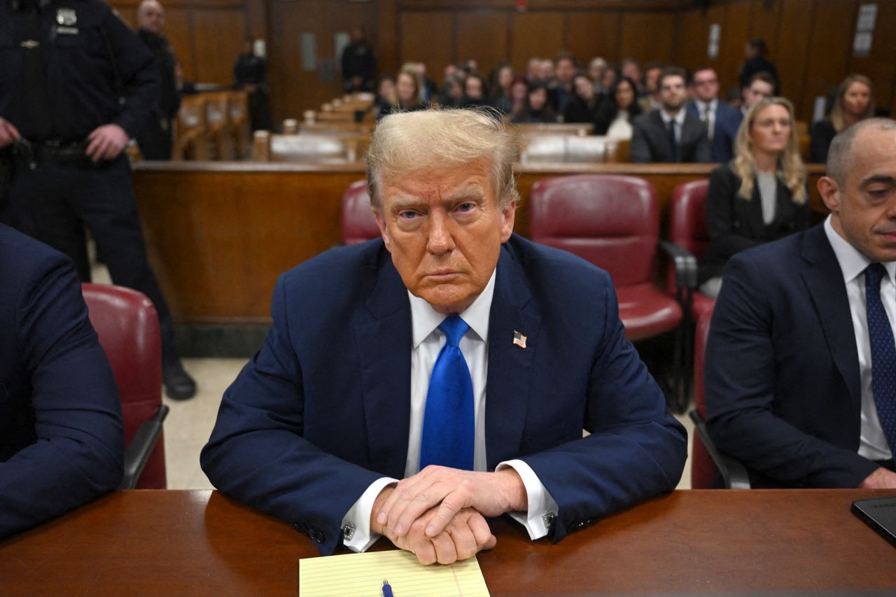 Former US president and Republican presidential candidate Donald Trump looks on at Manhattan Criminal Court during his trial for allegedly covering up hush money payments linked to extramarital affairs in New York on April 22.