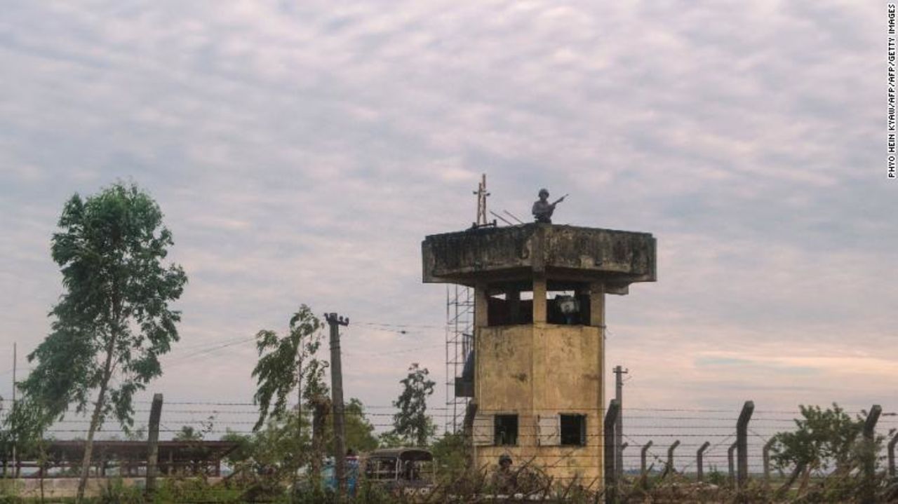 Guards keep watch near a border post in Rakhine state in Myanmar, November 12, 2017.