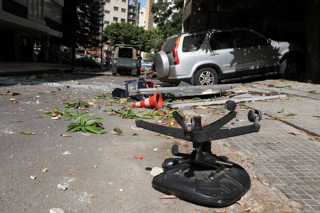 Shattered glass and debris are seen after gunfire erupted at a site near a protest against Judge Tarek Bitar in Beirut, Lebanon, on October 14.