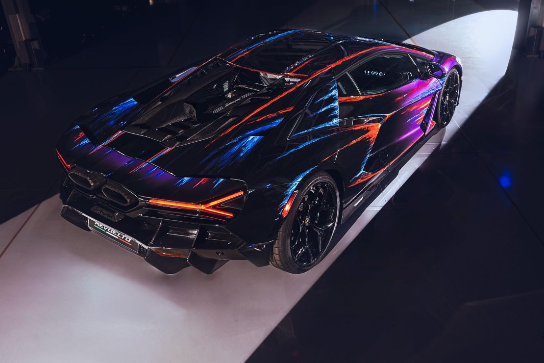 The Lamborghini Revuelto Opera Unica, a Lamborghini Revuelto plug-in hybrid supercar with a special hand-applied paint job that took 435 hours to complete, according to the automaker.
