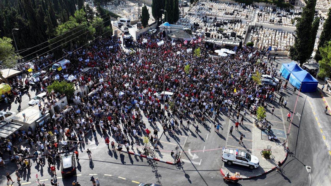 A drone view shows as people gather to pay their respects on the street on the day of the funeral of?Hersh?Goldberg-Polin in Jerusalem on September 2.