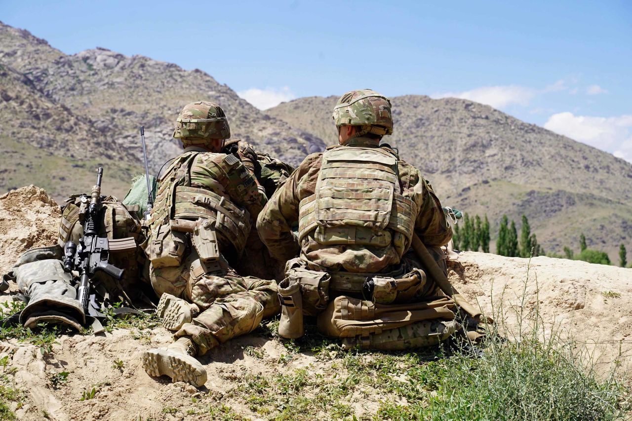 US soldiers look out over hillsides during a visit of General Scott Miller at the Afghan National Army (ANA) checkpoint in the Nerkh district of Afghanistan's Wardak province, in June 2019.