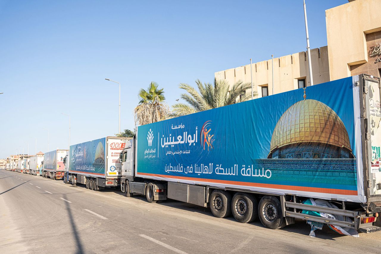 A convoy of trucks loaded with aid supplies for Gaza provided by Egyptian NGOs waits for an agreement to cross through the Egypt-Gaza border in Arish City, Egypt' on October 15.