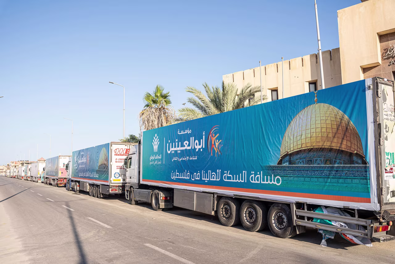 A convoy of trucks loaded with aid supplies for Gaza provided by Egyptian NGOs waits for an agreement to cross through the Egypt-Gaza border in Arish City, Egypt' on October 15.