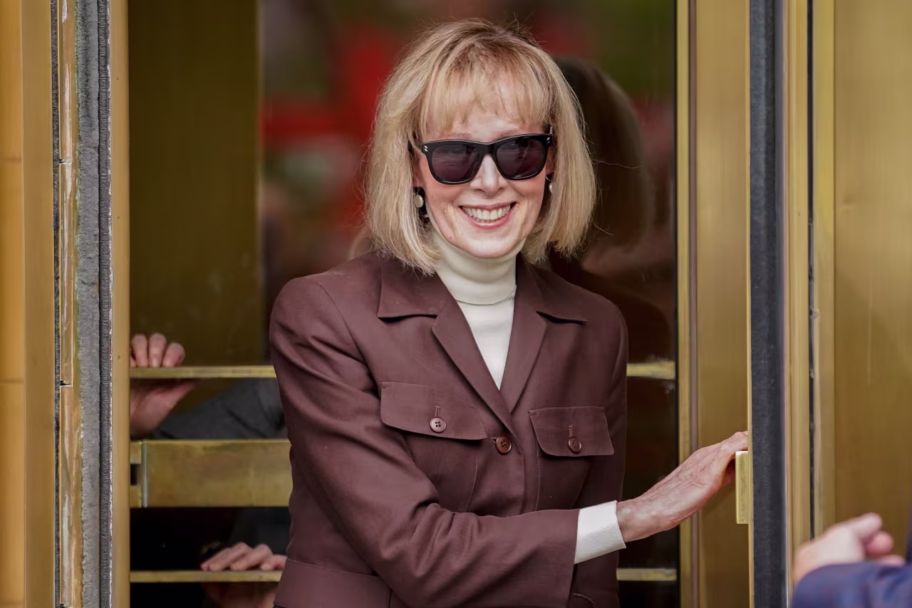 E. Jean Carroll walks out of Manhattan federal court on Tuesday, May 9, in New York. 