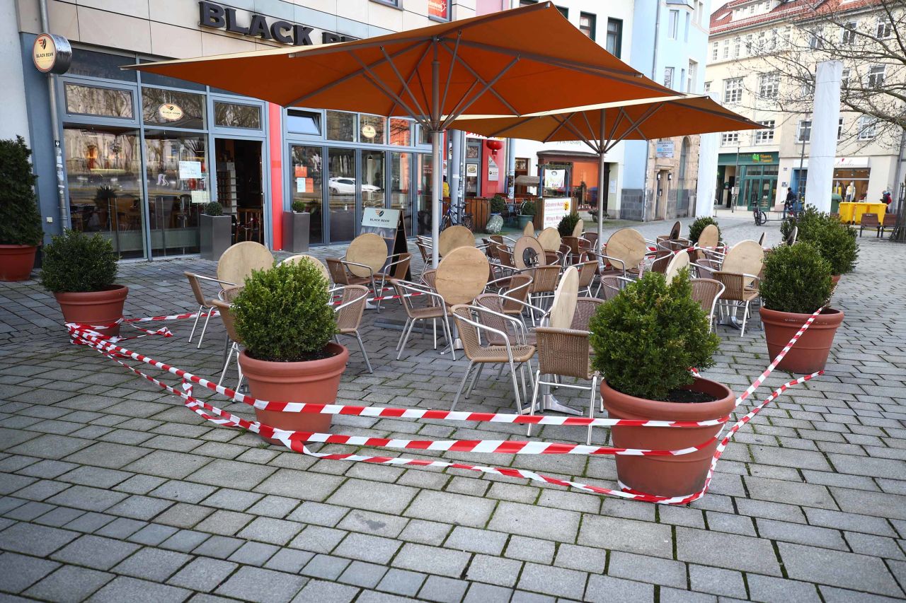 A restaurant's outside dining area is seen taped off in Jena, Germany, on March 18.