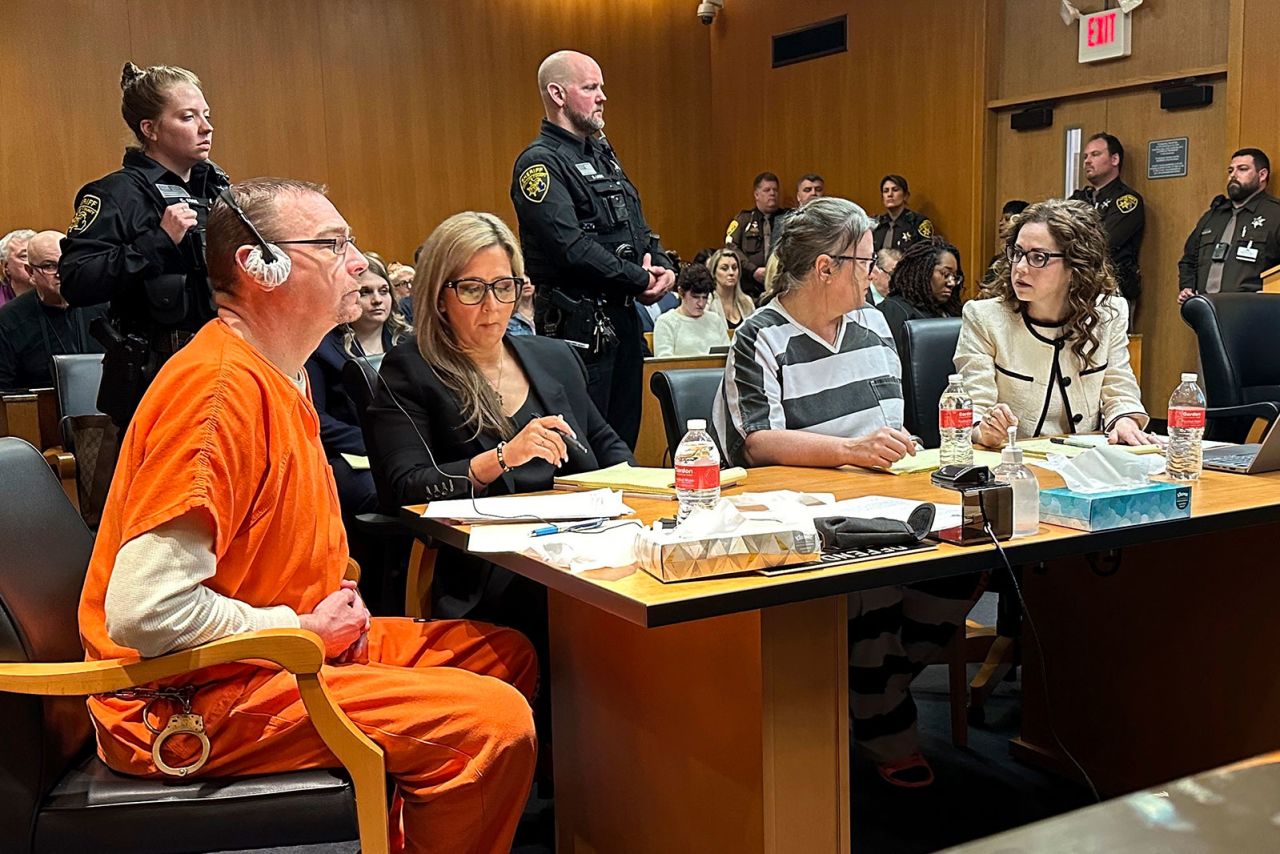 From left, James Crumbley, defense lawyer Mariell Lehman, Jennifer Crumbley, and defense lawyer Shannon Smith await sentencing in Oakland County, Michigan, court on Tuesday.