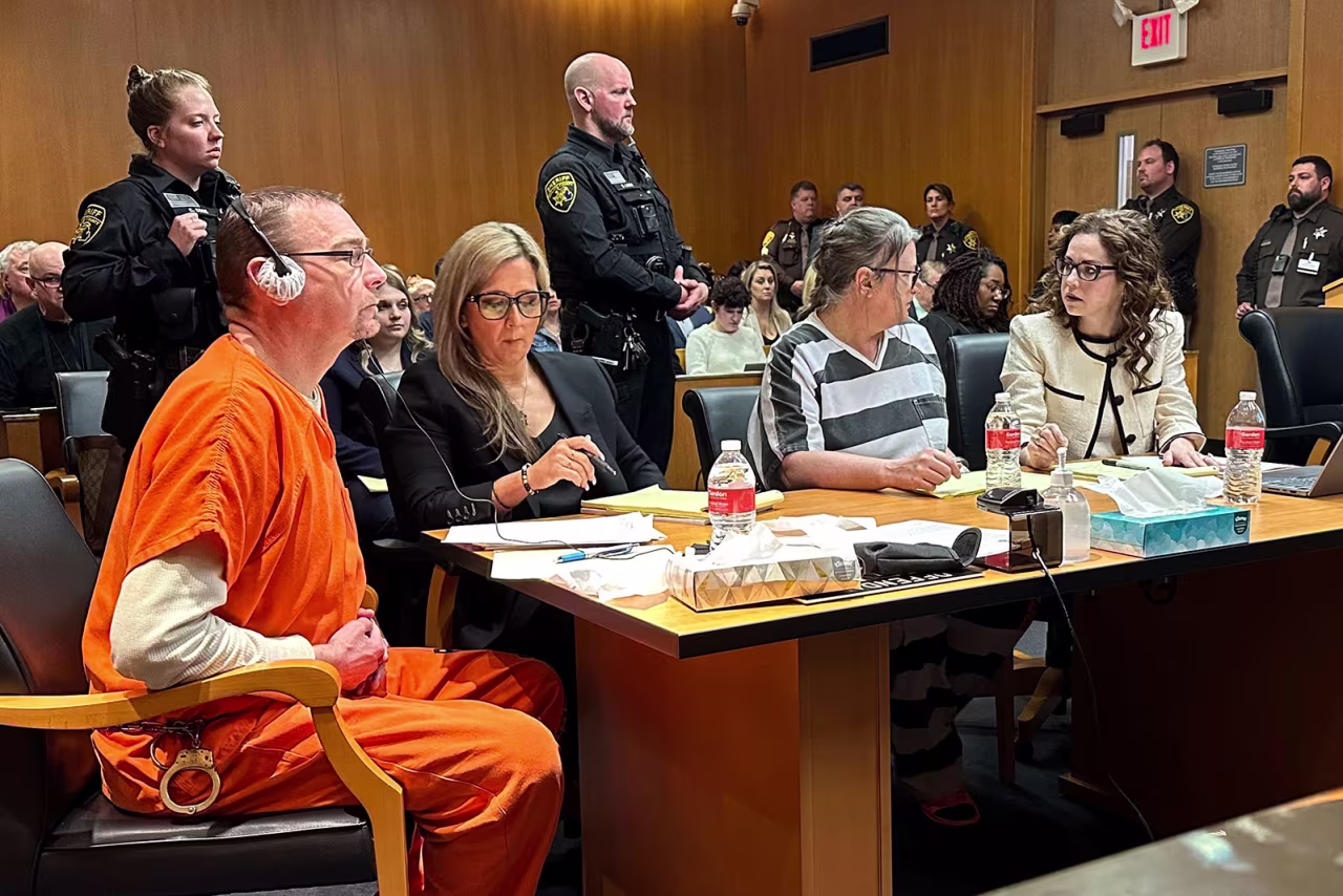 From left, James Crumbley, defense lawyer Mariell Lehman, Jennifer Crumbley, and defense lawyer Shannon Smith await sentencing in Oakland County, Michigan, court on Tuesday.