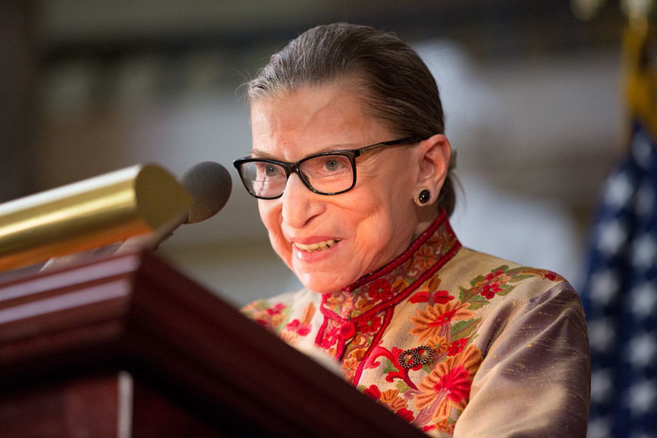 Justice Ruth Bader Ginsburg speaks at an annual Women's History Month reception in the US Capitol building in 2015. 