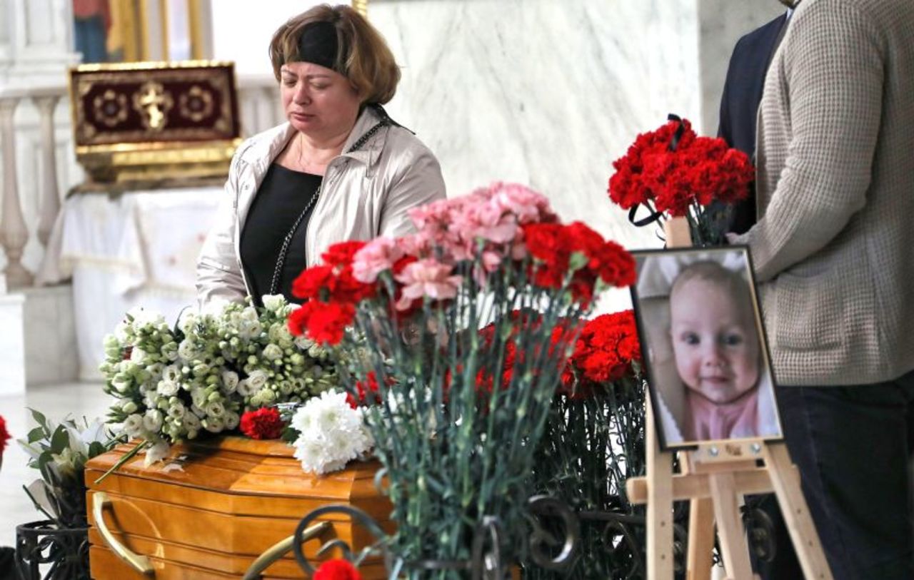 Relatives and friends attend the funeral service of Valeriia Hlodan, her 3-month-old baby girl Kira and her mother Liudmyla Yavkina at Transfiguration Cathedral in Odesa, Ukraine, on April 27.