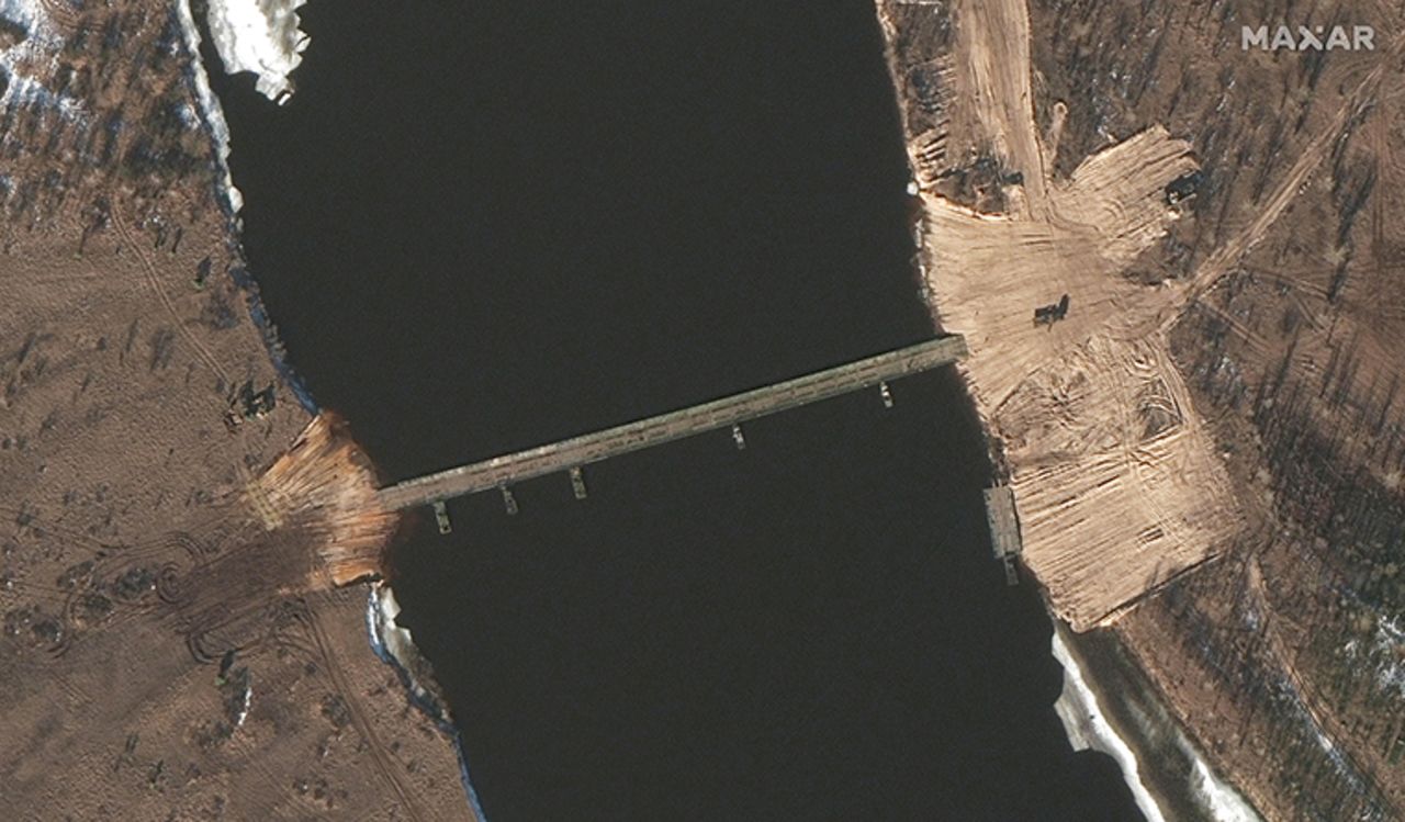 Satellite images taken over the past two days show new road construction and a tactical bridge being built across a key river in Belarus less than four miles from the Ukrainian border, amid what sources say is an ongoing buildup of Russian military forces encircling three sides of Ukrain